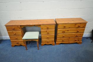 A MODERN PINE DRESSING TABLE, fitted with eight drawers, length 142cm x depth 44cm x height 78cm,