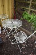 A WIRE CIRCULAR FOLDING PATIO TABLE, 72cm diameter x height 77cm, and two chairs (condition