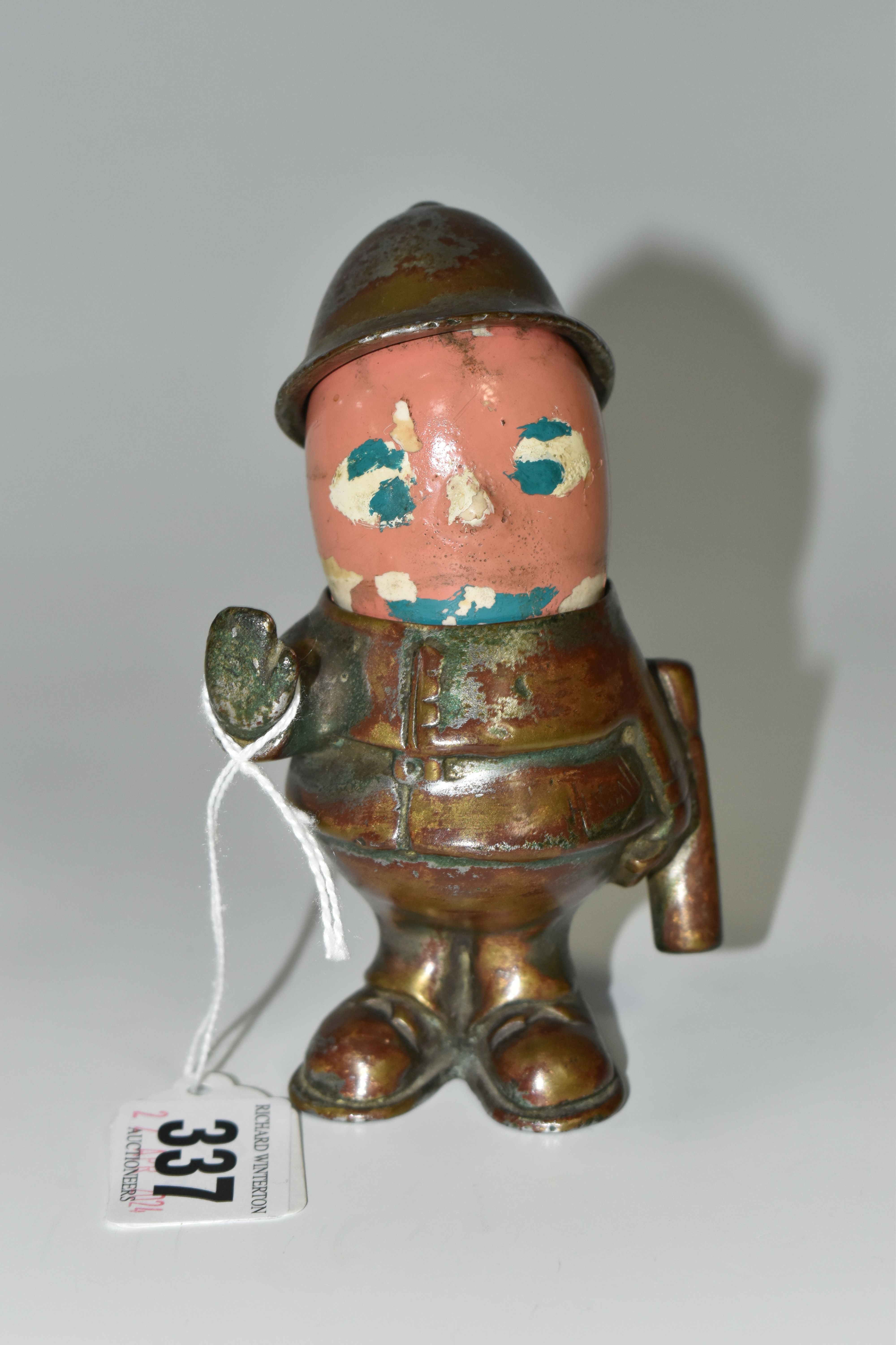 AN EARLY TWENTIETH CENTURY HASSALL 'BOBBY' POLICEMAN CAR MASCOT, chrome plated with a ceramic