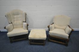 AN ERCOL 'CLOISTER' ELM AND BEECH THREE PIECE SUITE, comprising a ladies and gents armchair, along