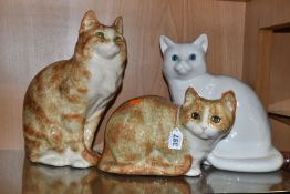 A GROUP OF TWO WINSTANLEY POTTERY CATS AND ONE SIMILAR, comprising a seated ginger cat, signed and