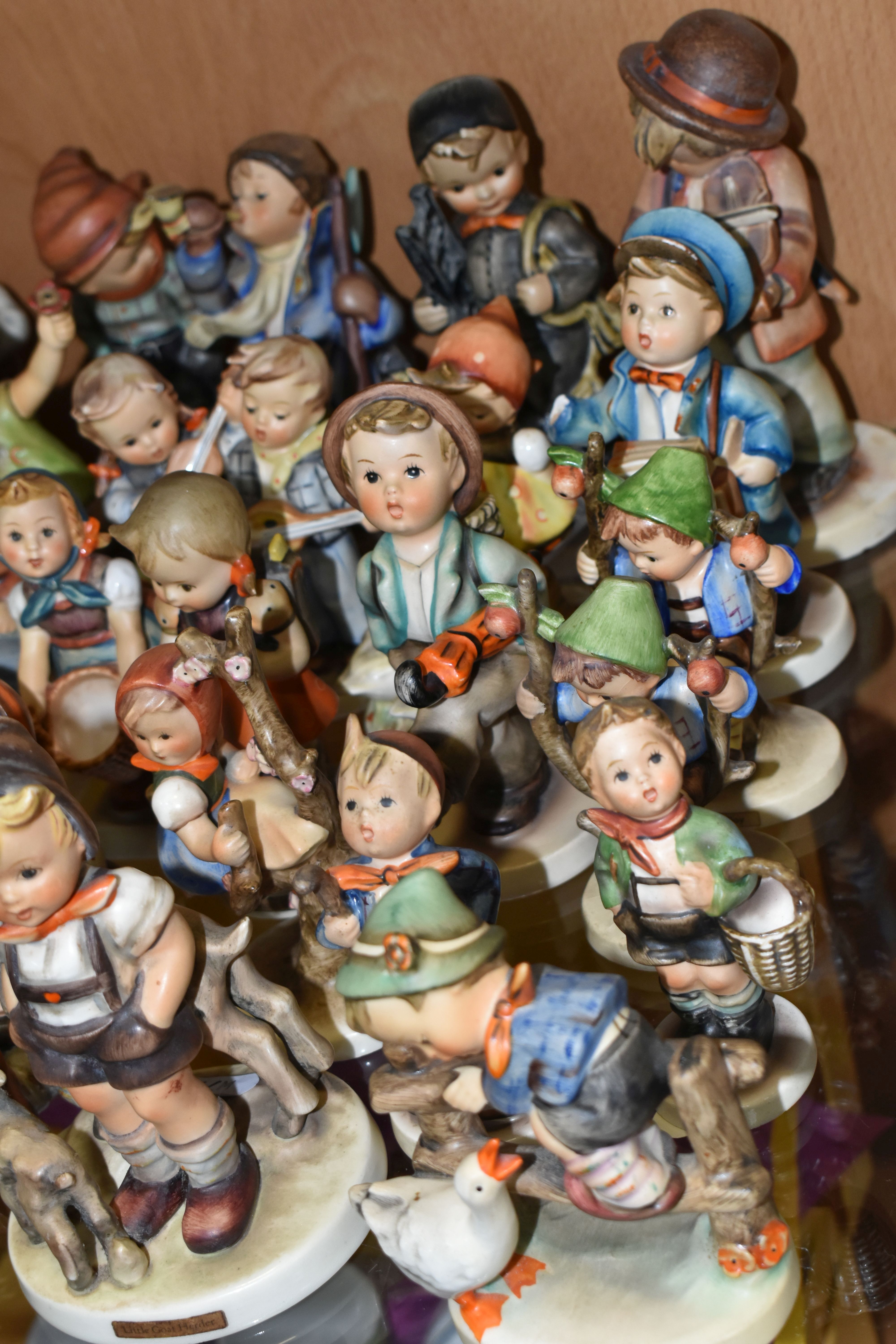 A GROUP OF TWENTY SIX MID-CENTURY GOEBEL FIGURES, comprising 195 Barnyard Hero, 110 Lets Sing, 69 - Image 2 of 9