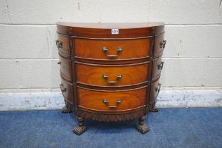 A REPRODUCTION HARDWOOD DEMI-LUNE CHEST OF NINE DRAWERS, with a sunburst top surface, reeded and