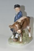 A ROYAL COPENHAGEN BOY WITH CALF FIGURE, no 772, with printed and painted marks to the base, also AB