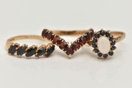 THREE 9CT GOLD GEM SET RINGS, the first a garnet nine stone wishbone ring, hallmarked 9ct