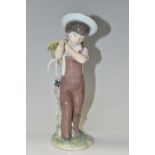 A LLADRO 'GATHERING FLOWERS' FIGURE, model no 8675, a 60th Anniversary figure issued in 2013,