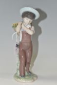 A LLADRO 'GATHERING FLOWERS' FIGURE, model no 8675, a 60th Anniversary figure issued in 2013,