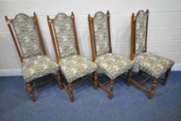 A SET OF FOUR 20TH CENTURY OAK DINING CHAIRS, with green and foliate upholstery, raised on turned