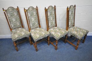 A SET OF FOUR 20TH CENTURY OAK DINING CHAIRS, with green and foliate upholstery, raised on turned