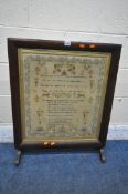A VICTORIAN ROSEWOOD TAPESTRY FIRE SCREEN, with a needlework mourning tapestry, width 64cm x 79cm (