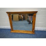 A GOOD QUALITY SOLID OAK OVERMANTEL MIRROR, with pillar style details, 104cm x 85cm (condition