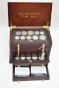 A SMALL WOODEN COIN CABINET, consisting of eight drawers seven containing UK coinage from 1939-1945,