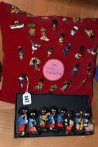 A COLLECTION OF ROBERTSONS JAM FIGURES AND BADGES, comprising eight chalkware jazz band musician