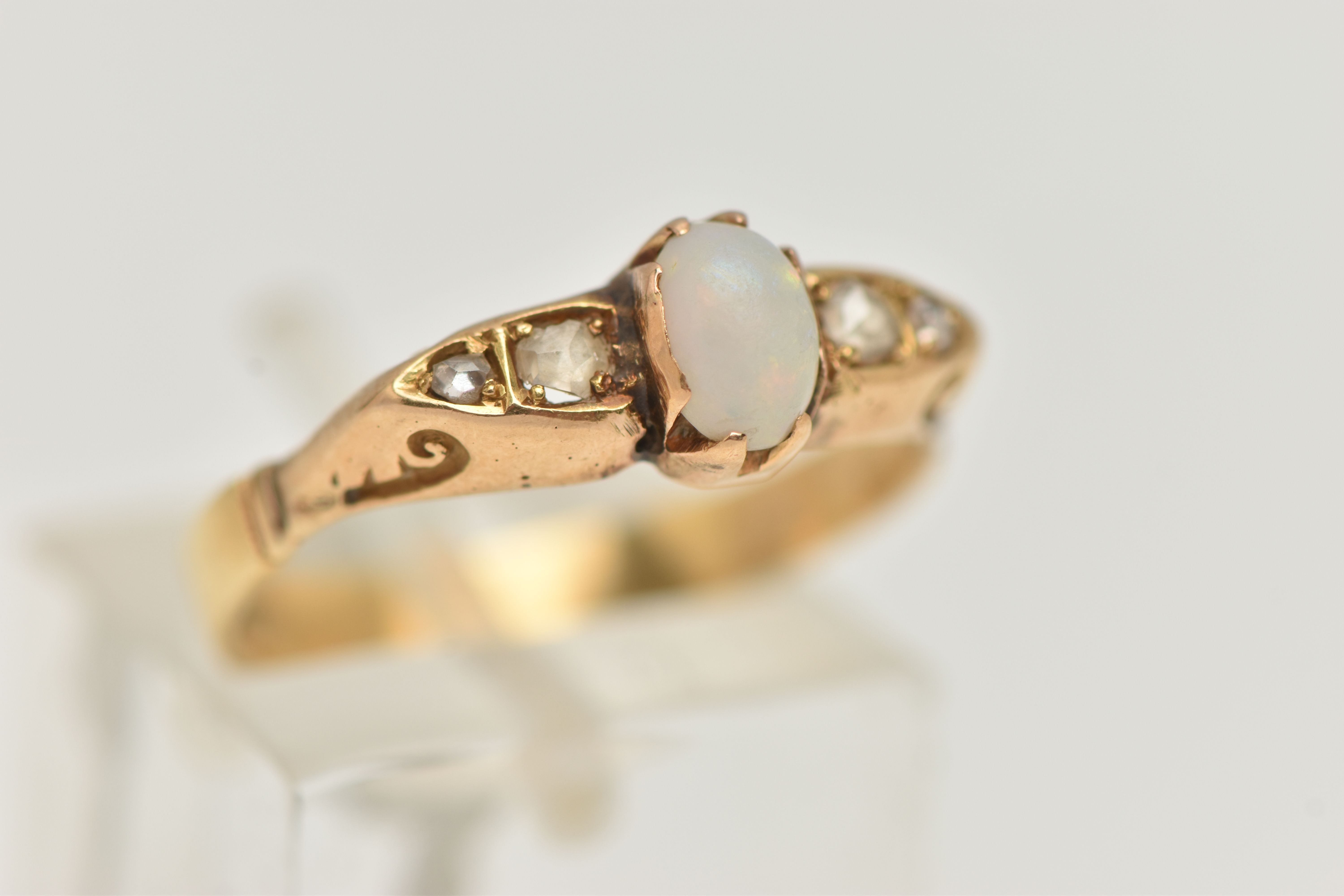 A YELLOW METAL OPAL AND DIAMOND RING, set with a central oval cut opal cabochon (abraded), measuring - Image 4 of 4