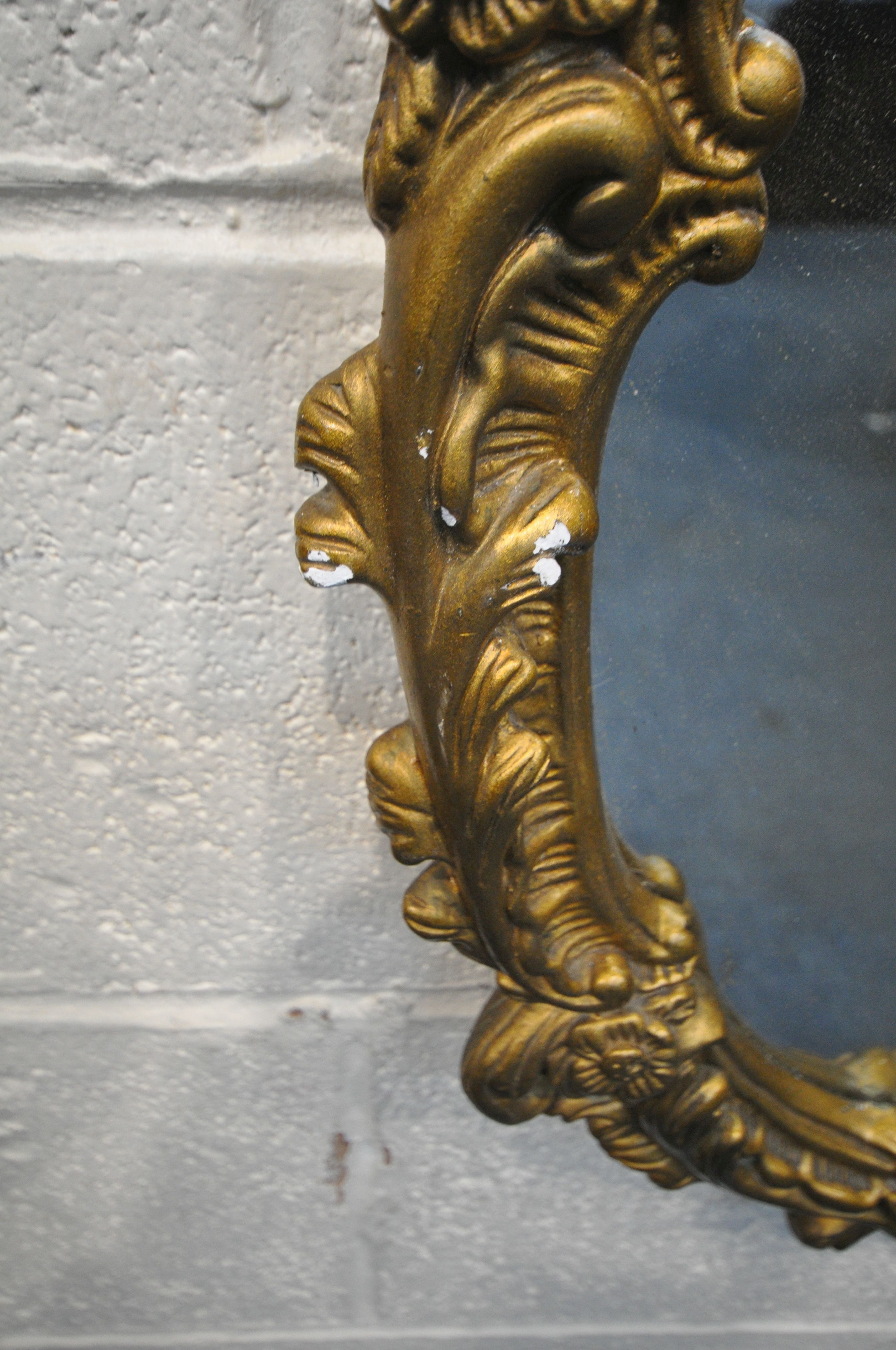 A GILT RESIN WALL MIRROR, with foliate frame, 45cm x 62cm, along with a circular bevelled edge - Image 3 of 3