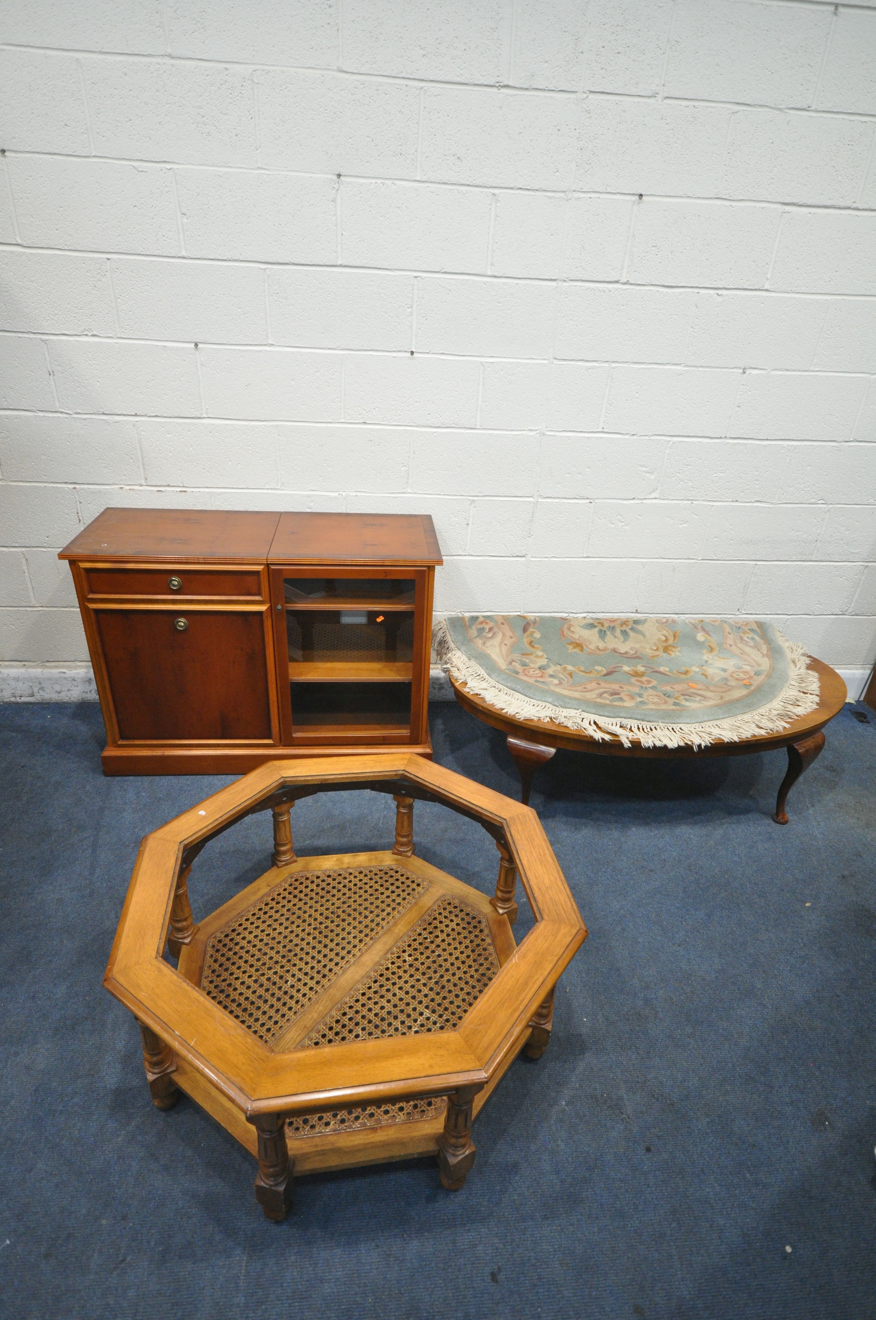 A YEW WOOD MEDIA CABINET, fitted with a hinged lid, a glass door, a cupboard door and a single