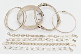 ASSORTED SILVER AND WHITE METAL BRACELETS, to include a wide silver hinged bangle, etched with