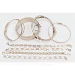 ASSORTED SILVER AND WHITE METAL BRACELETS, to include a wide silver hinged bangle, etched with