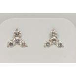 A PAIR OF 18CT GOLD DIAMOND EARRINGS, designed as a trefoil cluster of four round brilliant cut