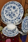 SIX PIECES OF MEISSEN 'BLUE ONION' TEA/DINNER WARE, comprising a teacup and saucer, two side