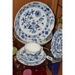 SIX PIECES OF MEISSEN 'BLUE ONION' TEA/DINNER WARE, comprising a teacup and saucer, two side