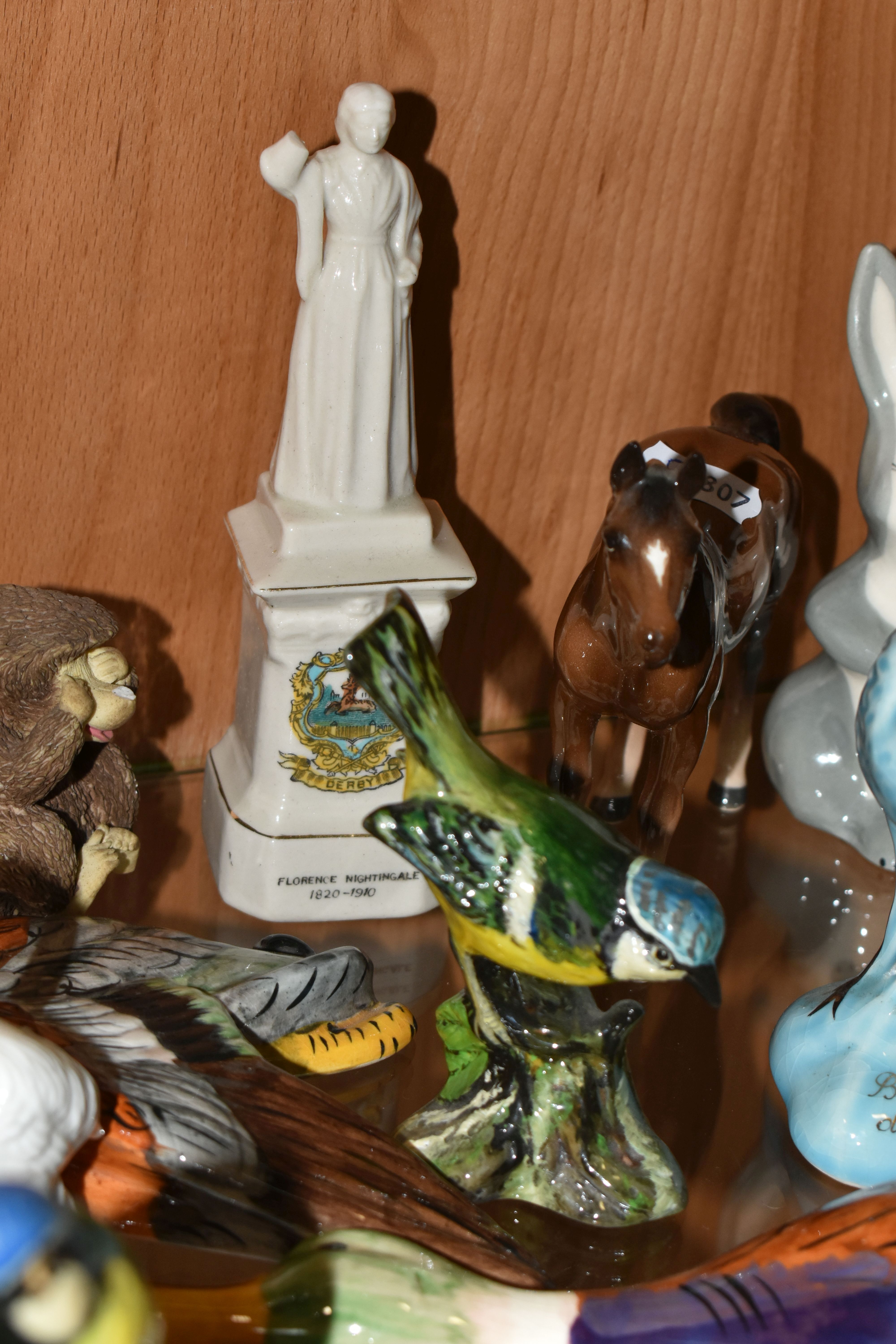 A COLLECTION OF ANIMAL AND BIRD FIGURES, over twenty pieces, to include a Beswick lying down Siamese - Image 7 of 11