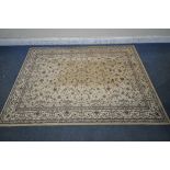 A DUNELM RECTANGULAR RUG, depicting repeating foliate patterns, with a multi-strap border, 228cm x