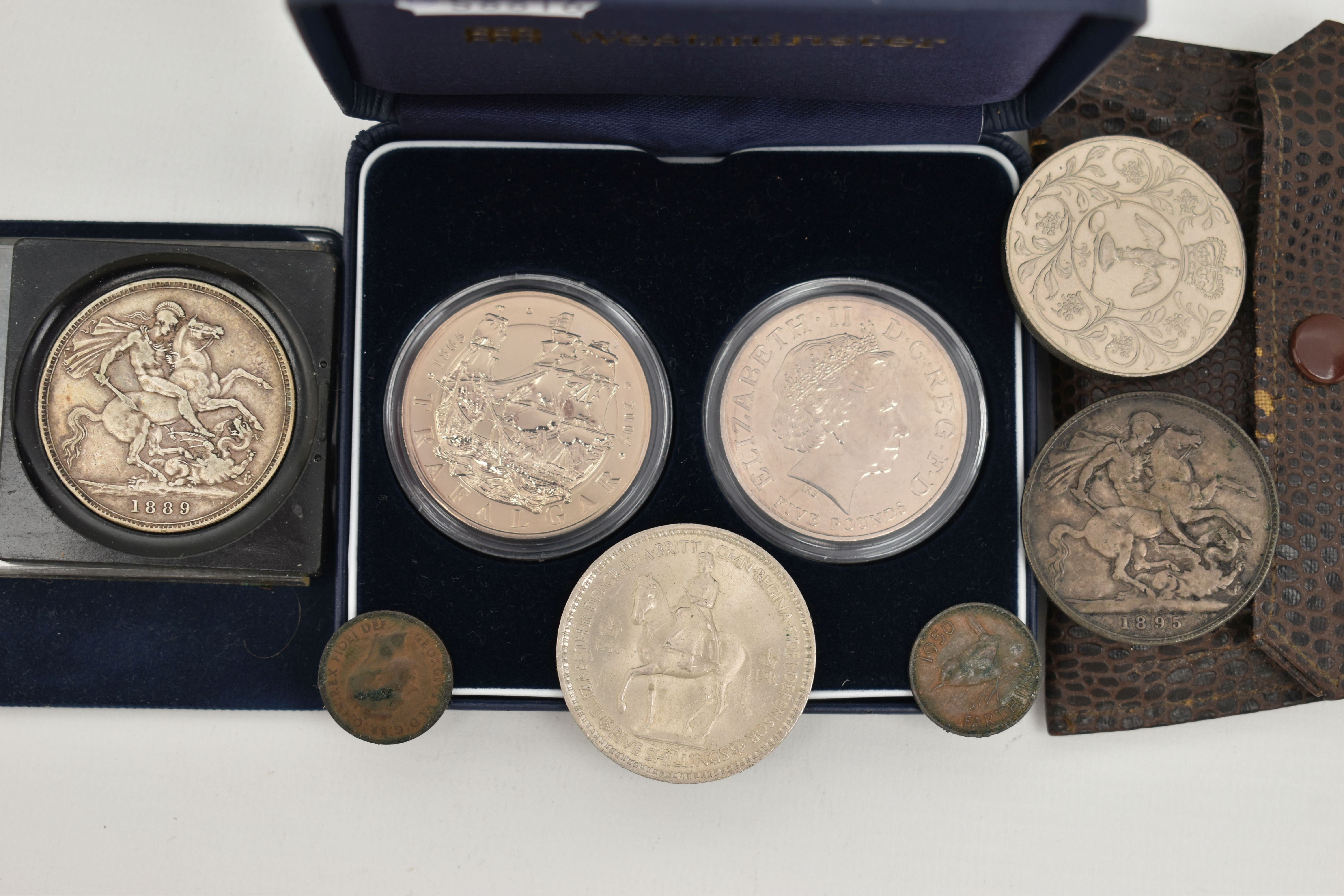 A SMALL ASSORTMENT OF COINS, to include cased pair of five pound coins, also including four
