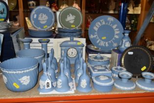 A COLLECTION OF WEDGWOOD BLUE JASPER WARES ETC, to include twelve bells, pair of dwarf candlesticks,