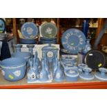 A COLLECTION OF WEDGWOOD BLUE JASPER WARES ETC, to include twelve bells, pair of dwarf candlesticks,