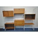 A MID CENTURY TEAK LADDERAX UNIT, comprising four white painted uprights, a fall front bureau