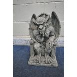A MODERN COMPOSITE GROTESQUE, seated on a throne width 30cm x depth 20cm x height 48cm (condition-