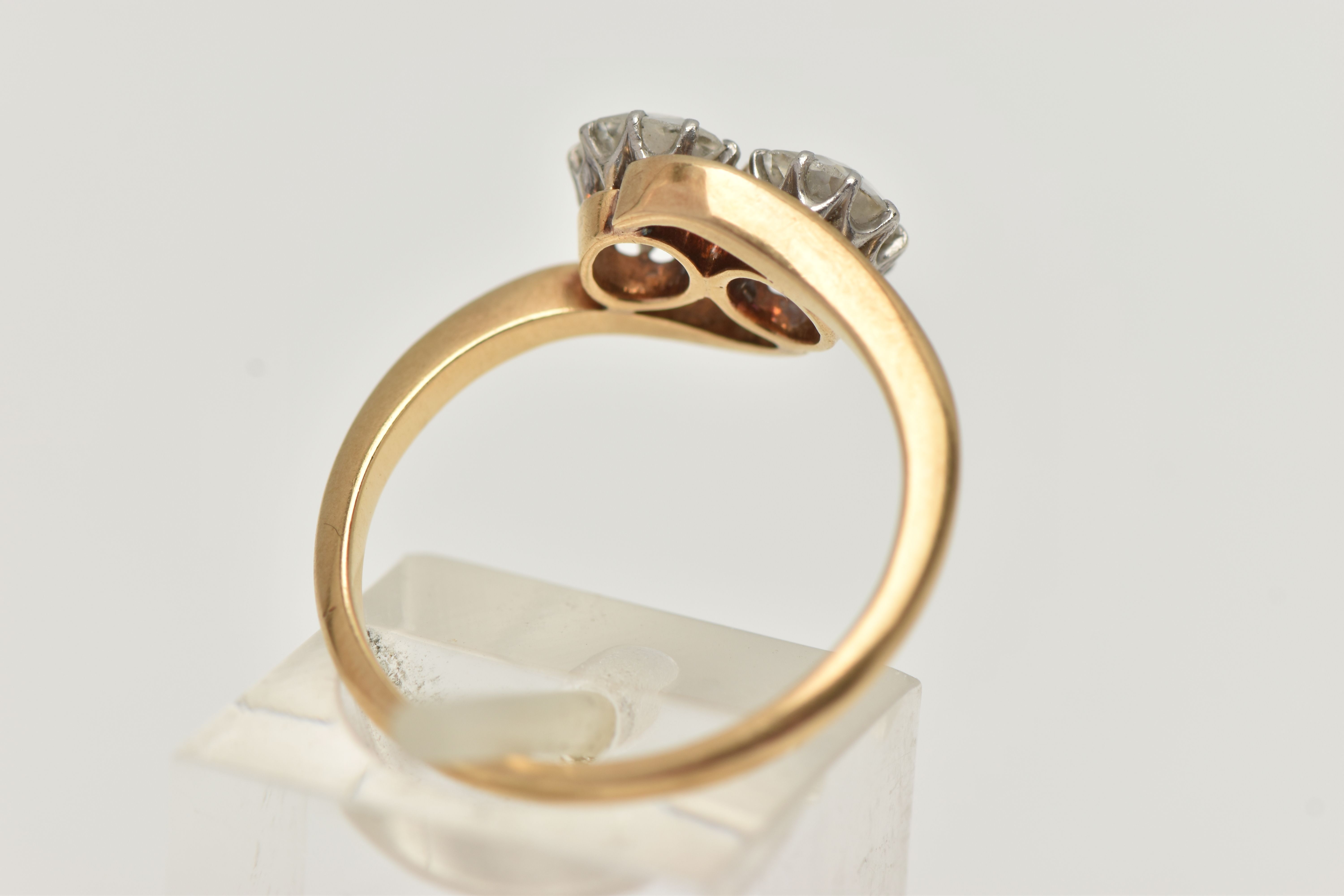 A YELLOW METAL DIAMOND TWO STONE RING, two old cut diamonds, each in a ten claw white metal setting, - Image 3 of 4