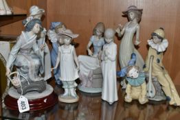 A GROUP OF LLADRO AND NAO FIGURINES, comprising Lladro figures 'Picture Perfect' model no 7612,