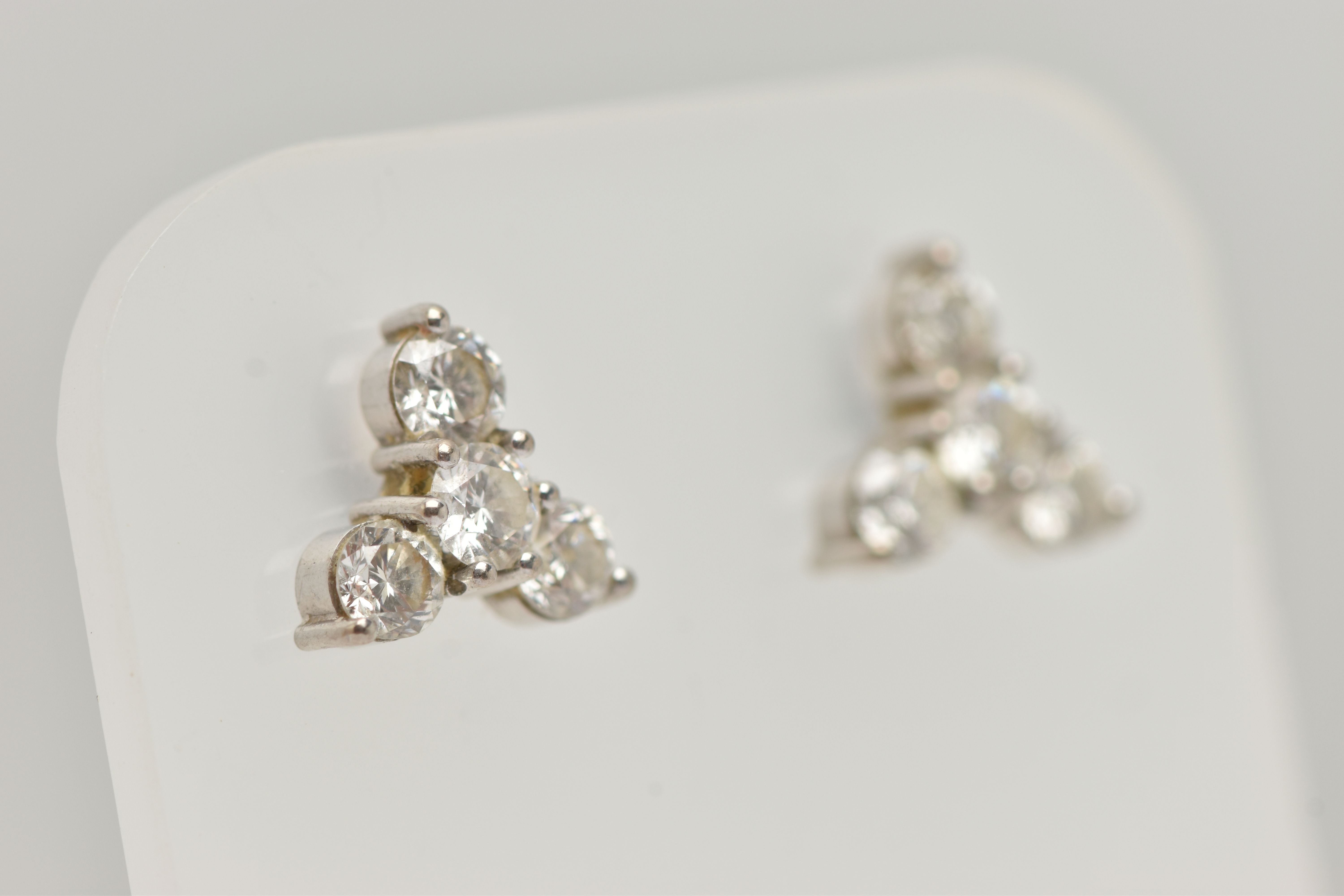 A PAIR OF 18CT GOLD DIAMOND EARRINGS, designed as a trefoil cluster of four round brilliant cut - Image 2 of 4