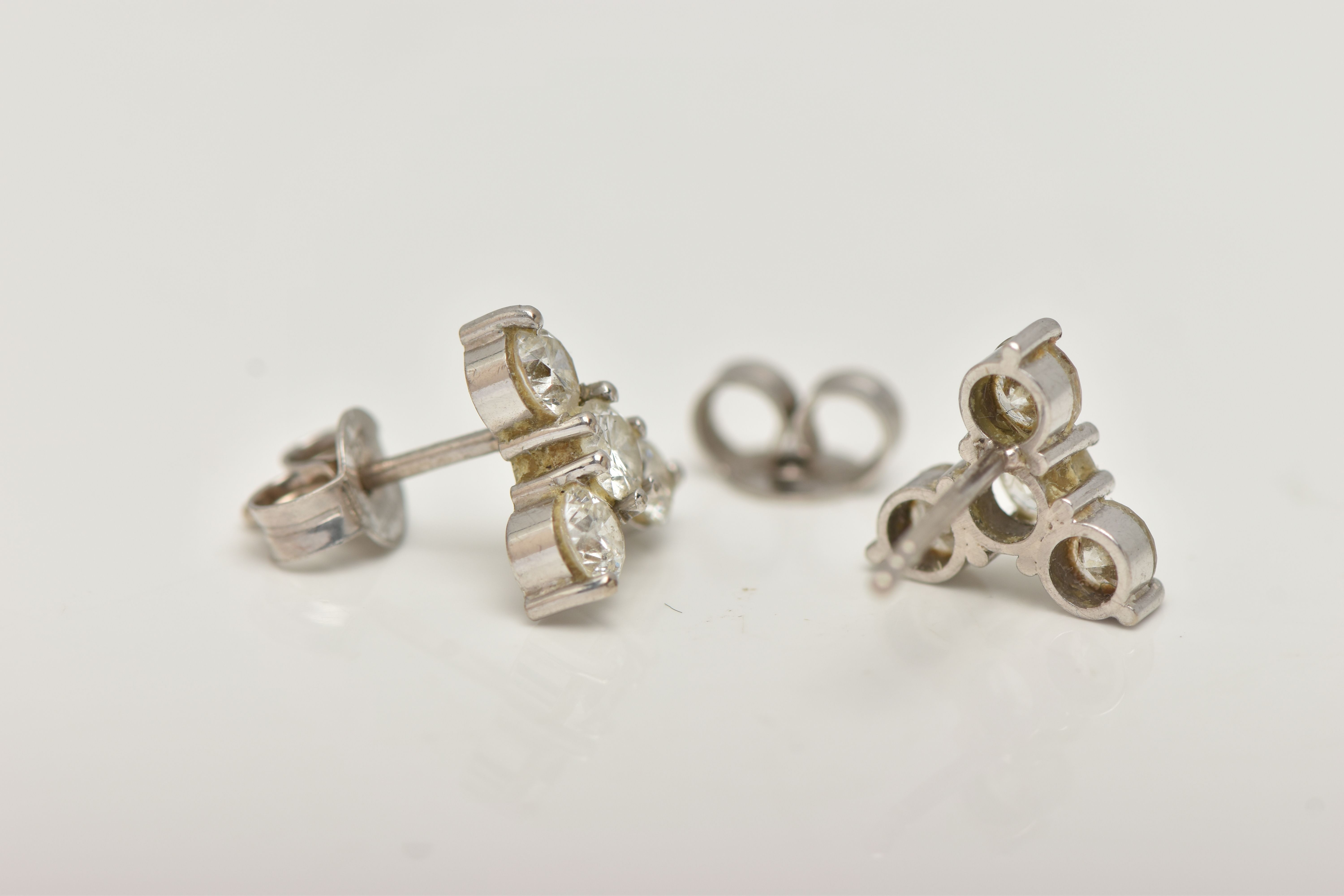 A PAIR OF 18CT GOLD DIAMOND EARRINGS, designed as a trefoil cluster of four round brilliant cut - Image 4 of 4