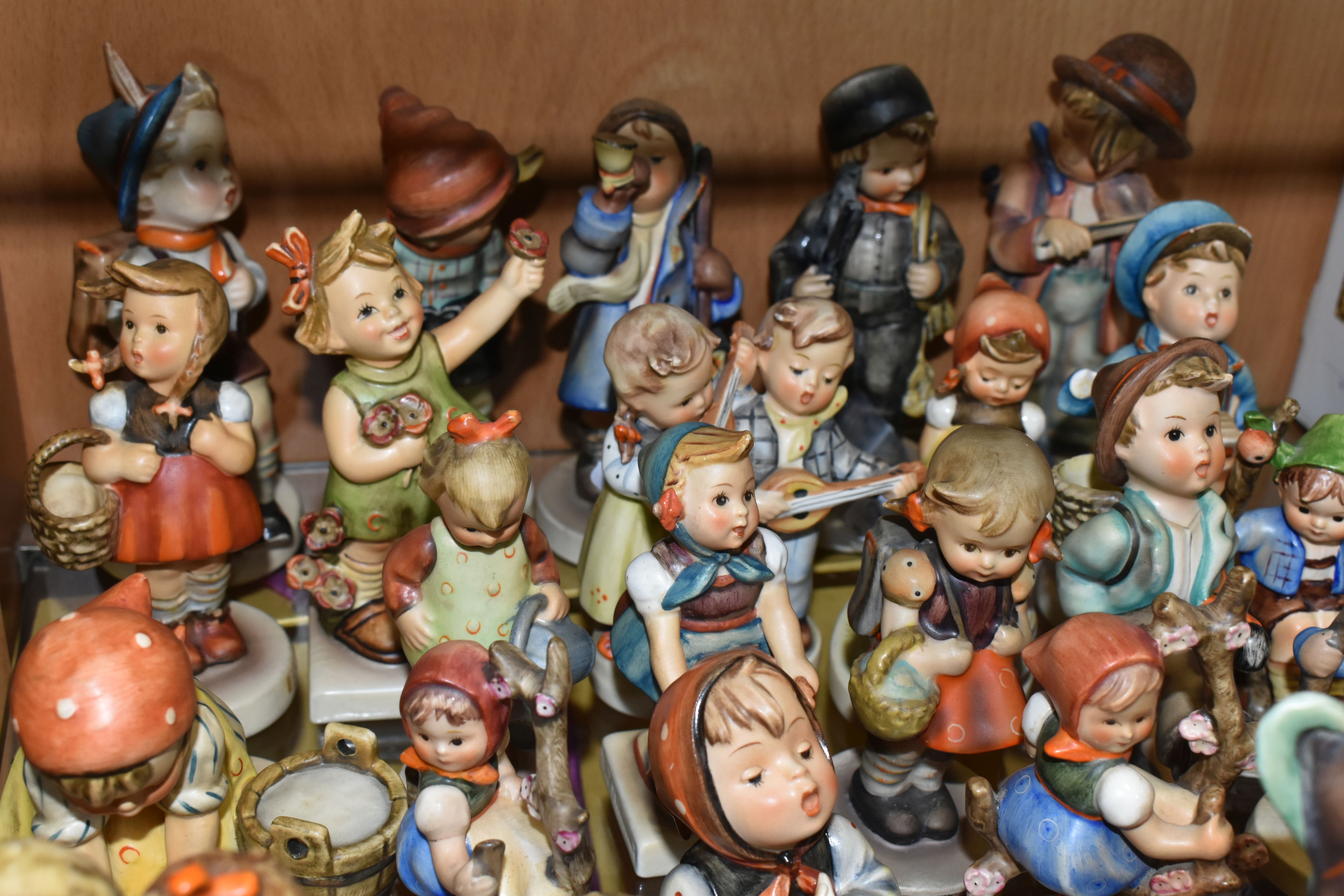 A GROUP OF TWENTY SIX MID-CENTURY GOEBEL FIGURES, comprising 195 Barnyard Hero, 110 Lets Sing, 69 - Image 4 of 9