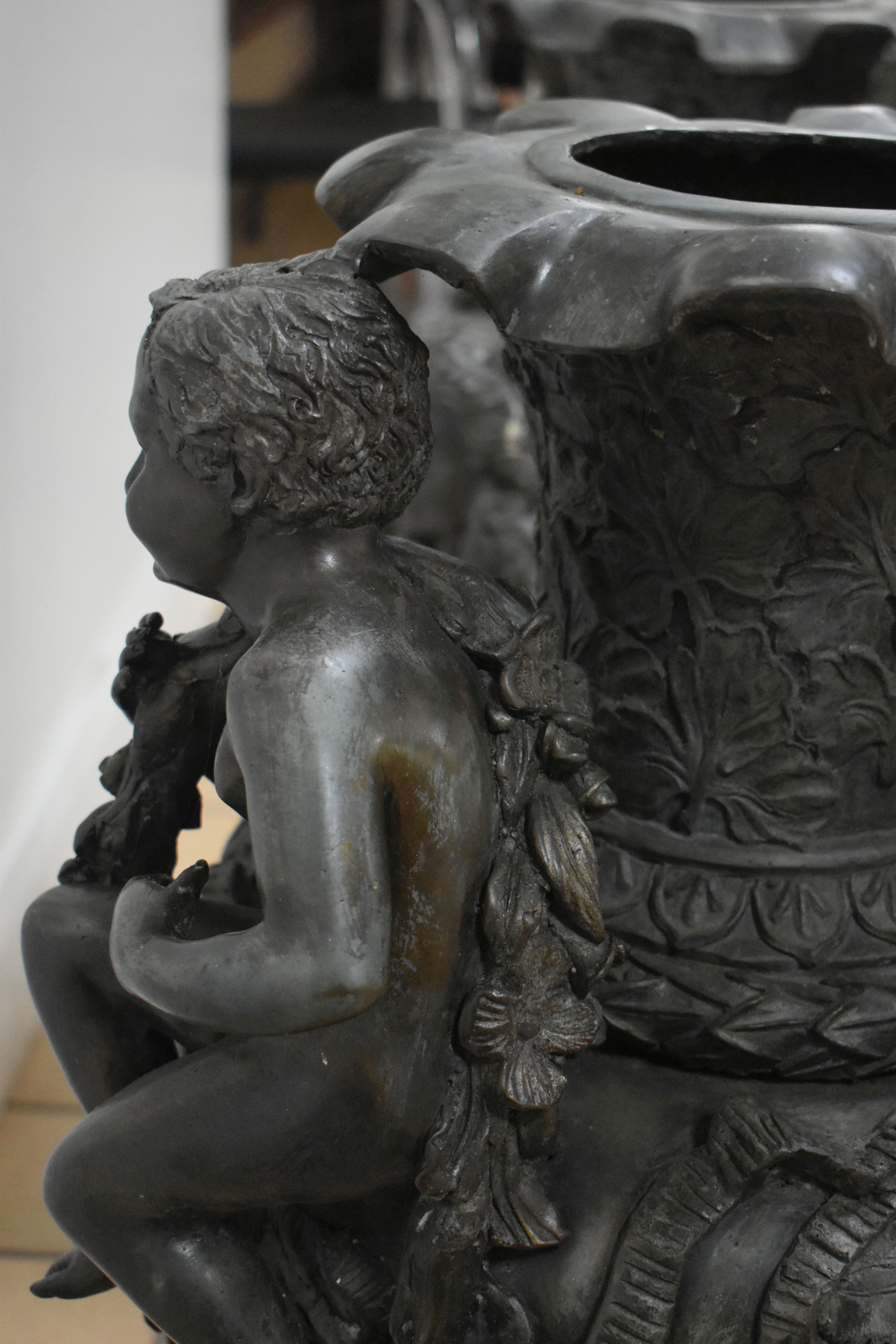 A PAIR OF SECOND HALF 20TH CENTURY WEATHERED BRONZE URNS, cast with two seated putti, two female - Image 13 of 15