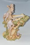 A ROYAL DUX CENTREPIECE, modelled in the form of a large shell with two female figures, model no