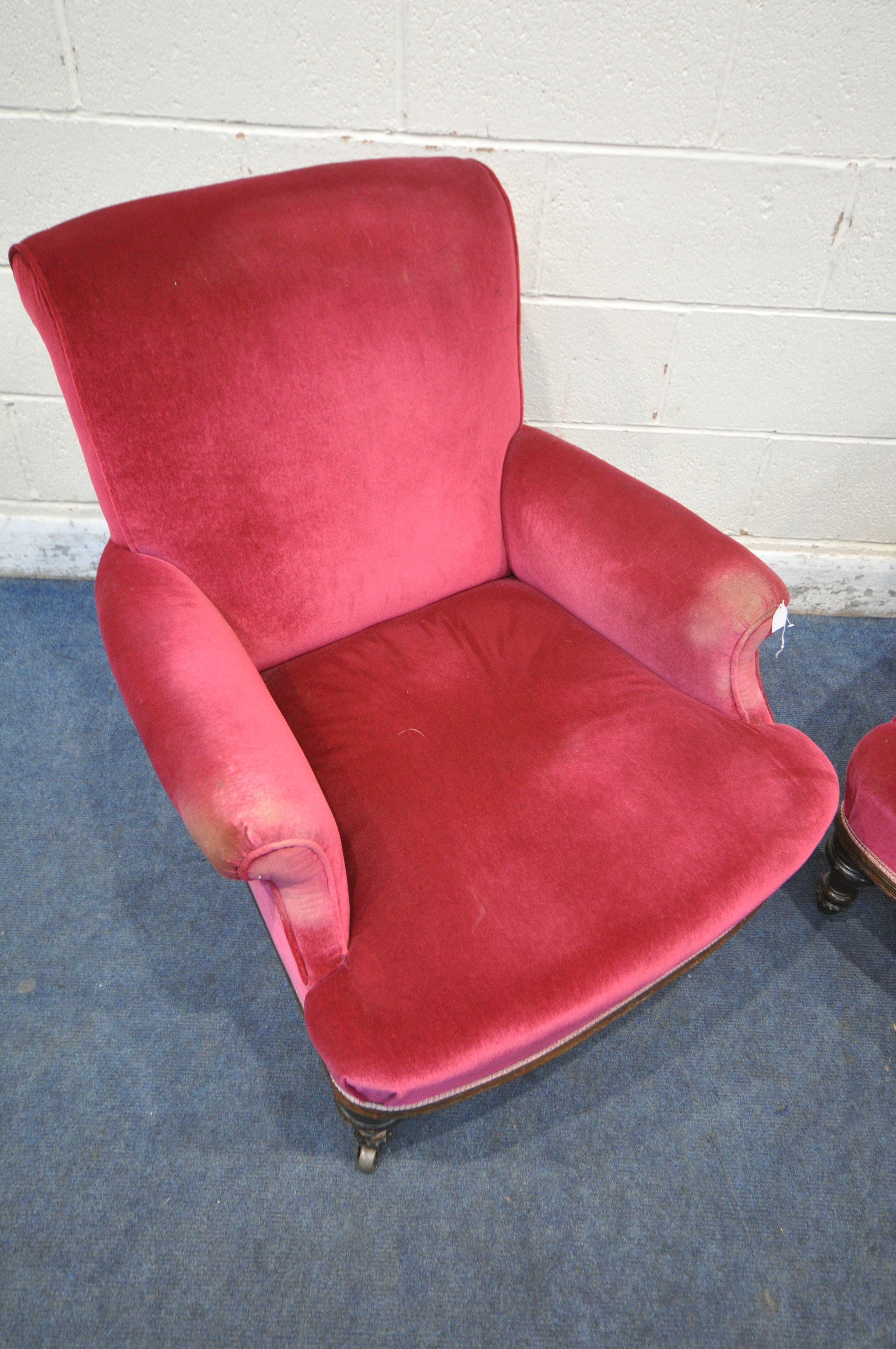 A PAIR OF EARLY 20TH CENTURY ARMCHAIRS, with maroon upholstery, on turned front legs and brass - Image 3 of 4