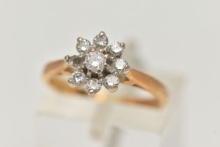 AN 18CT GOLD DIAMOND CLUSTER RING, of a flower shape, set with eight round brilliant cut diamonds (