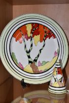 A BIZARRE CRAFT 'HONOLULU' CHARGER AND SUGAR SIFTER BY RENE DALE, each painted with a stylised tree,