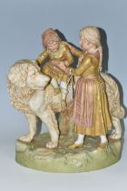 A ROYAL DUX FIGURE GROUP SPILL VASE OF A NEWFOUNDLAND DOG WITH A YOUNG GIRL ON ITS BACK BEING