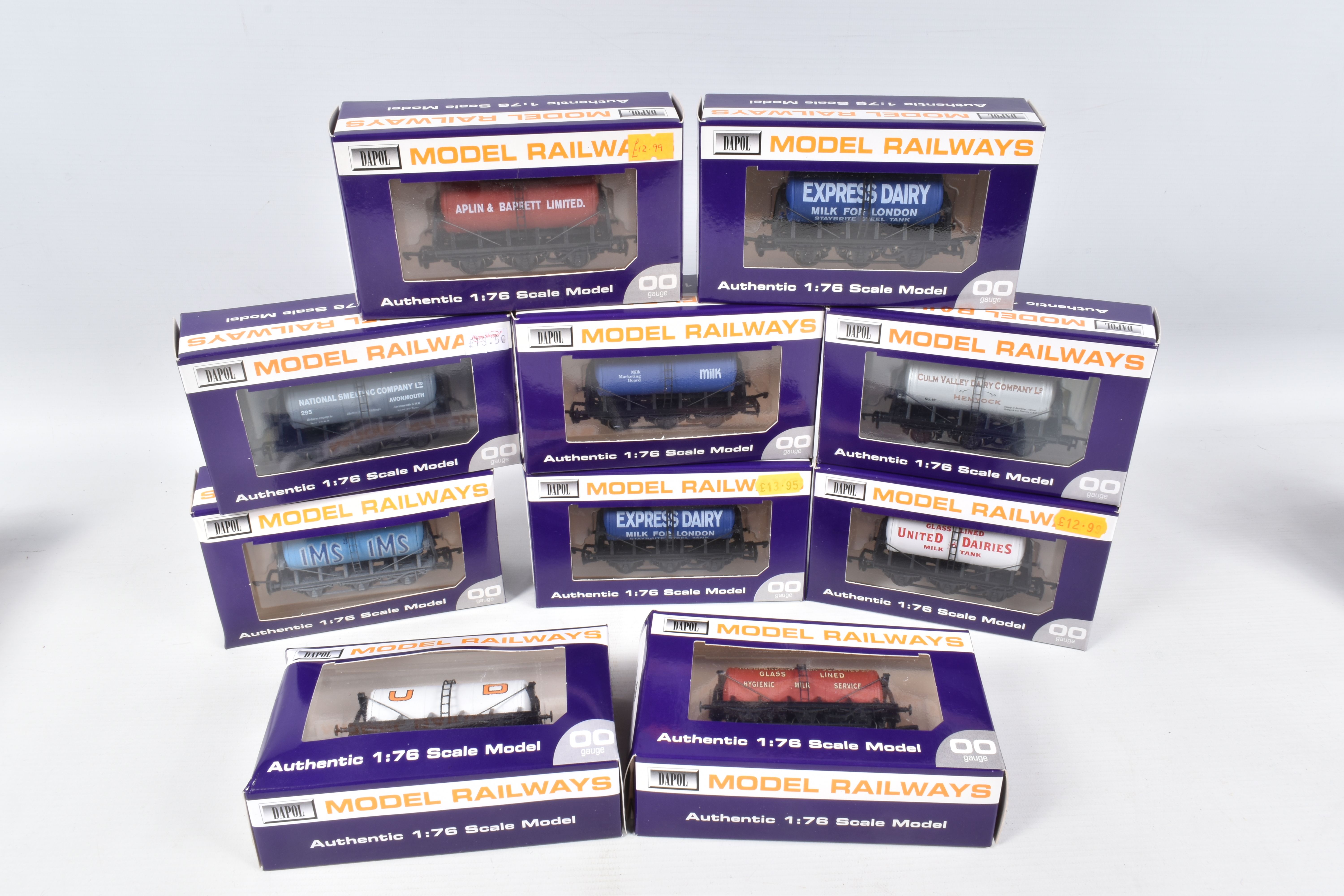 TEN BOXED OO GAUGE DAPOL MODEL RAILWAY WAGON SIX WHEEL TANKERS, to include a Milk UD, item no. B762,