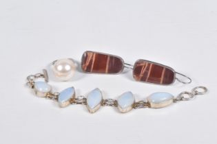 A SMALL ASSORTMENT OF JEWELLERY, to include a large white metal and gem set bracelet, fitted with