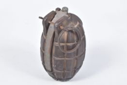 AN INERT MARK ONE NUMBER 36 MILLS BOMB GRENADE, this appears to be in good condition and still has