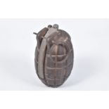 AN INERT MARK ONE NUMBER 36 MILLS BOMB GRENADE, this appears to be in good condition and still has