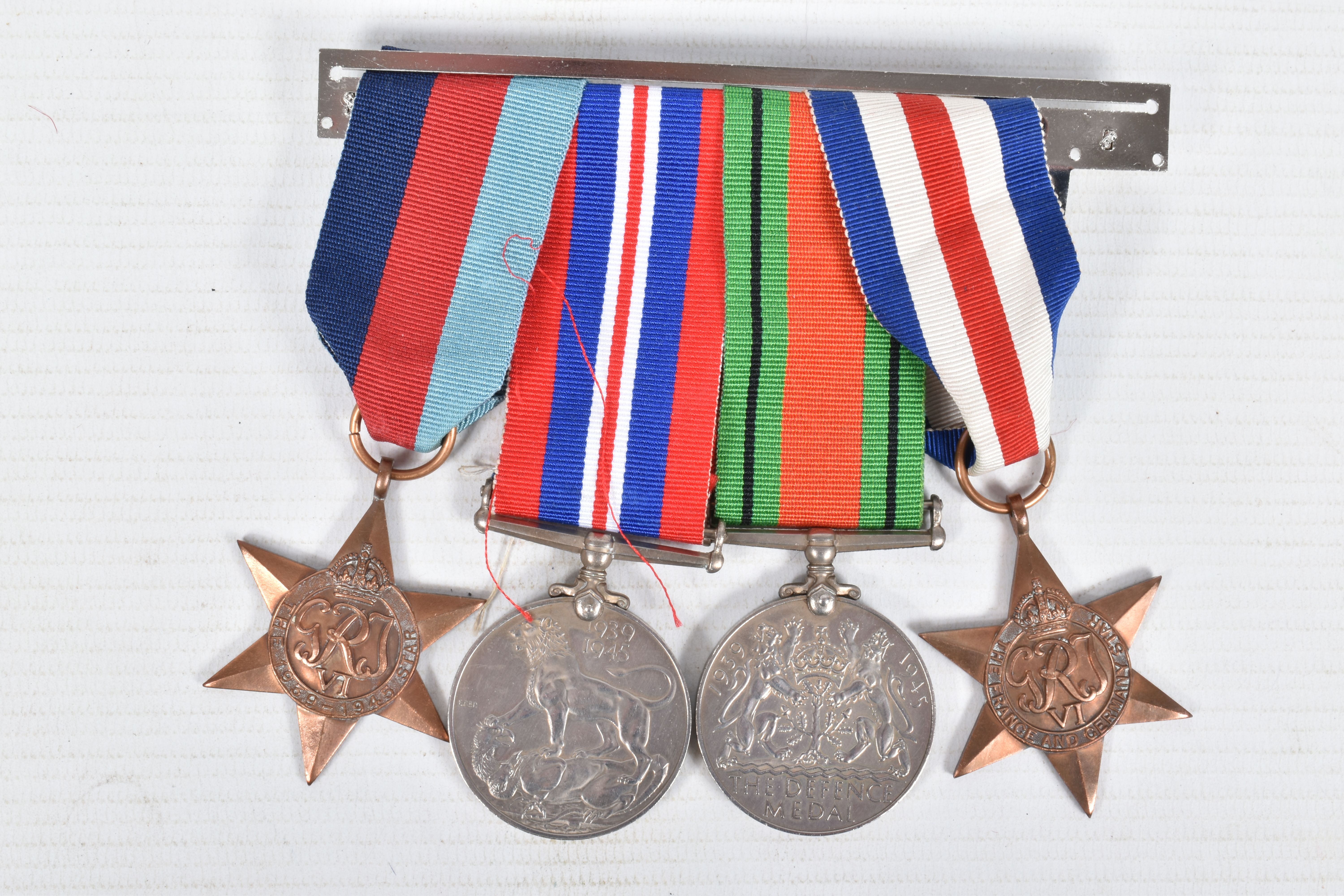 A PAIR OF WWI MEDALS AND FOUR WWII MEDALS, the WWI medals are correctly named to private 99551 Afred - Image 2 of 13