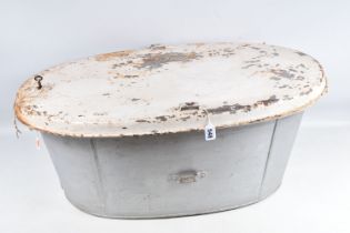 A 19TH CENTURY HOME FRONT STEEL BATH WITH ORIGINAL TOP, this bath is cream in colour on the lid
