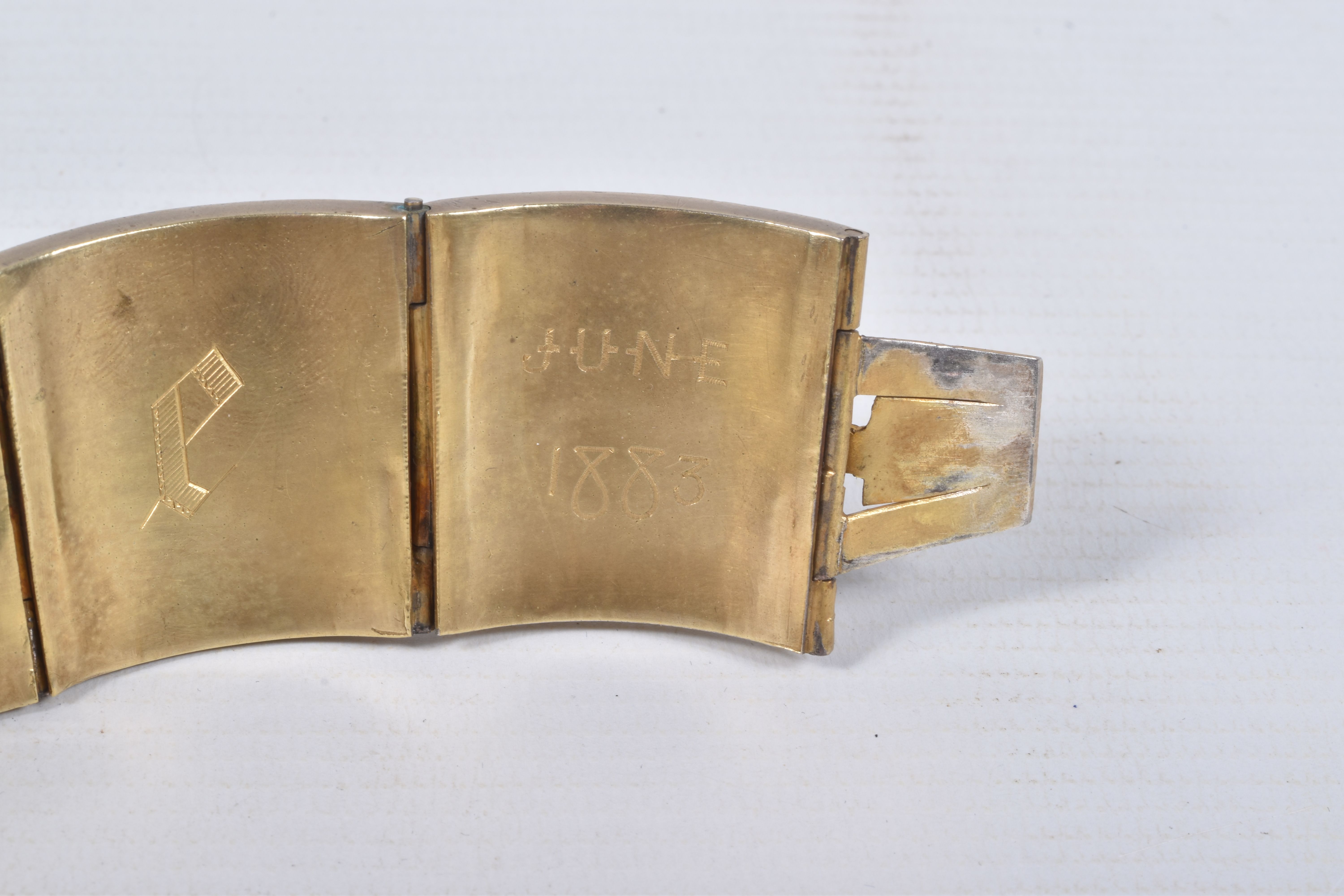 A VICTORIAN GILT BRACELET, comprised of six slightly tapered panels, embossed with an Indian design, - Image 5 of 5